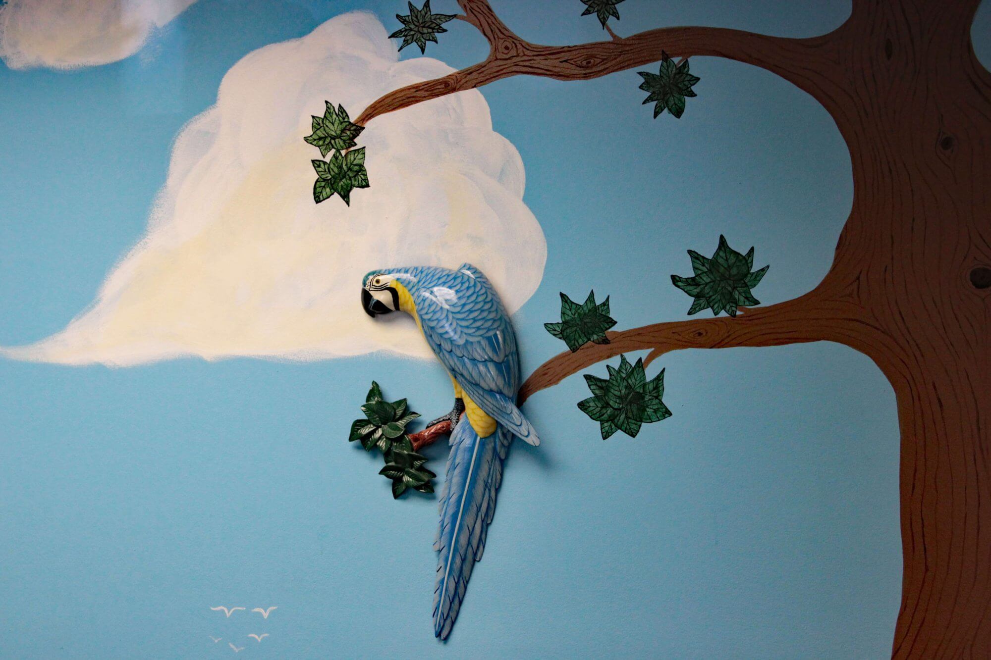 Fake Tropical Bird on tree mural